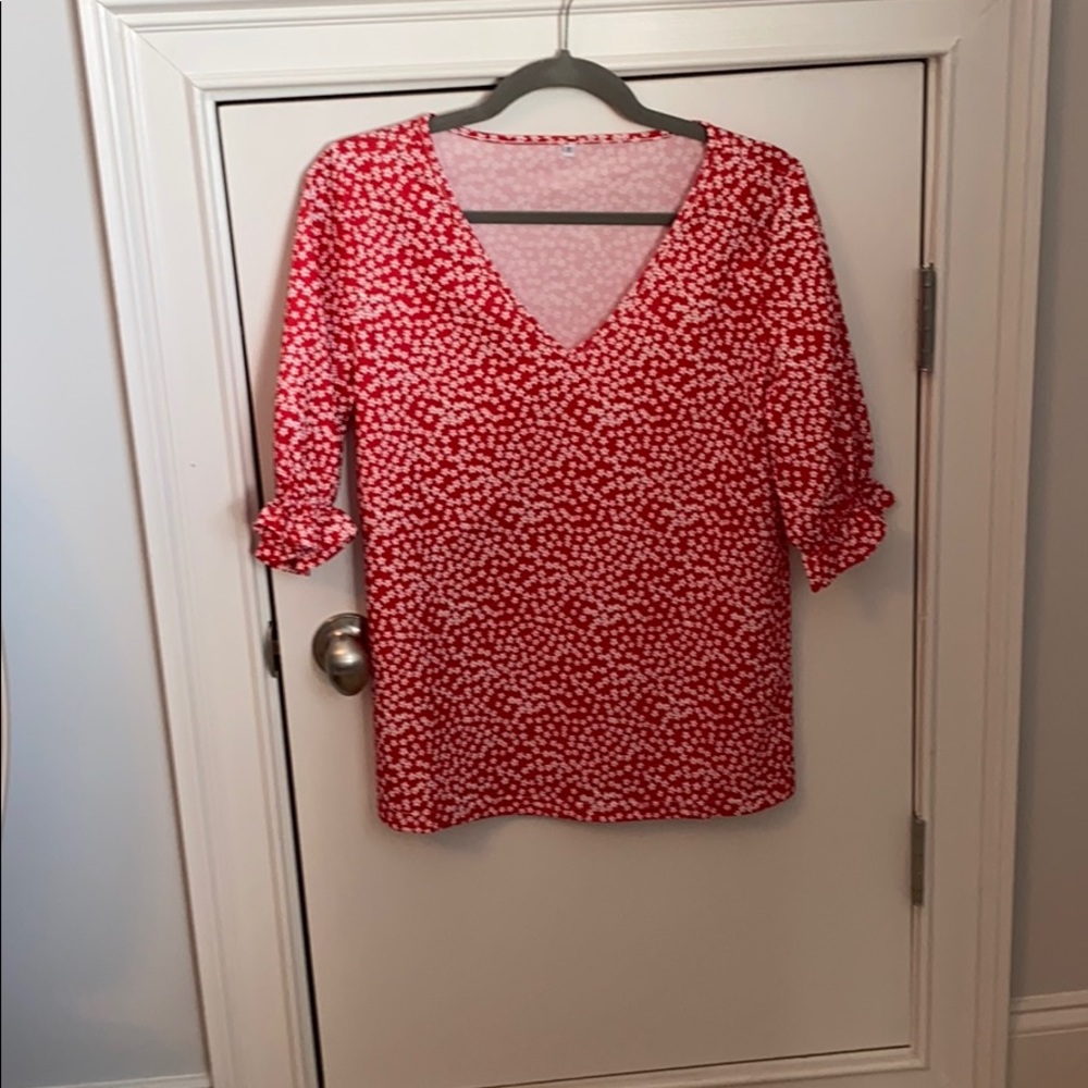 Size S/M women’s dress shirt.